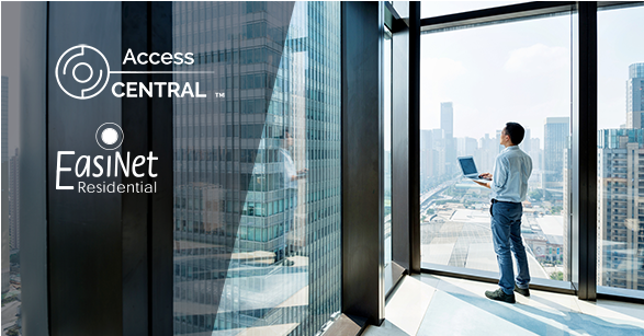 Image of man staring out of skyscraper view with logos